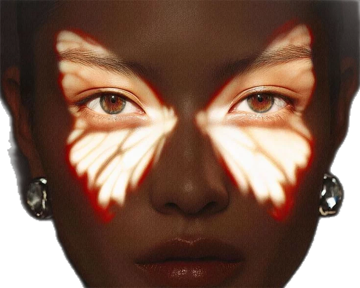 TALIA — a face with butterfly-shaped light across the eyes